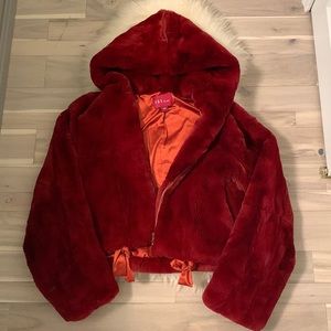 Fox: This is a heavy, well made fur coat. Genuine rabbit fur,simply GORGEOUS!